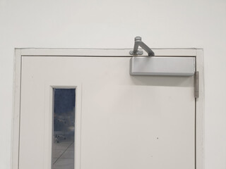 Door closer : A manual door closer stores the energy used in the opening of the door in a...