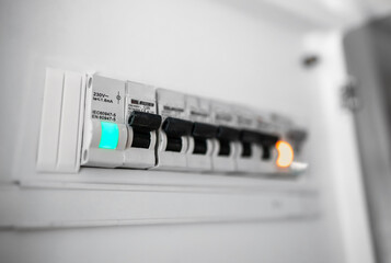 Close-up view of switches on fuse board. - obrazy, fototapety, plakaty