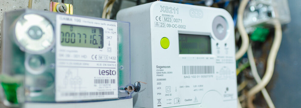 Smart electric power meter counter measuring power usage.Close-up of modern smart grid residential digital power supply meter.Banner.Telsiai,Lithuania.07-12-2023.
