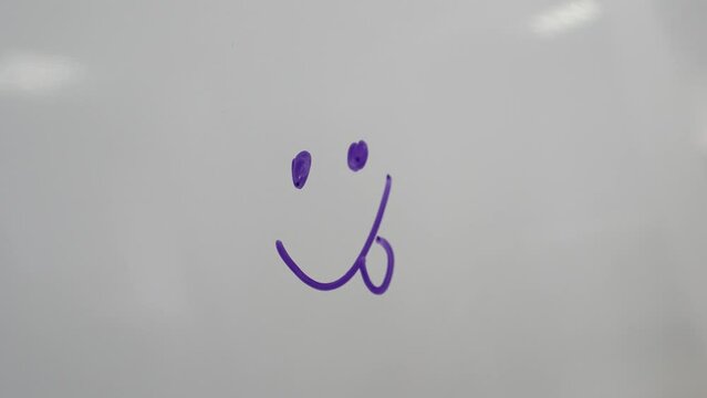 working meeting
the man draws graphs of the growth and decrease of profits on the board and explains the company's development strategy to the employees