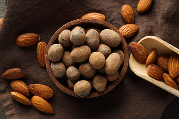 Tasty and sweet food - almonds in chocolate