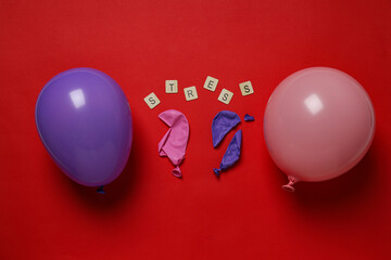 Balloons and word Stress on red background