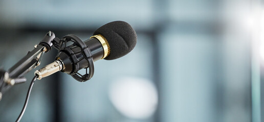 Conference, bokeh and a microphone in an office for a speech, work event or presentation. Mockup, business and a mic or banner for a meeting, workshop speaker or a corporate seminar at the workplace