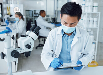 Laboratory, man and scientist writing clipboard information, healthcare research or medicine...