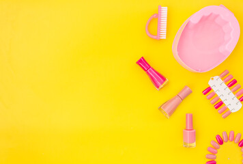 Set of trend pastel colors gel varnishes with manicure and pedicure beauty tools