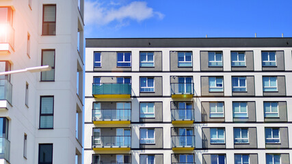 Modern apartment building in sunny day. Exterior, residential house facade.