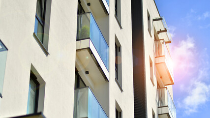 Obraz premium Modern apartment building in sunny day. Exterior, residential house facade.