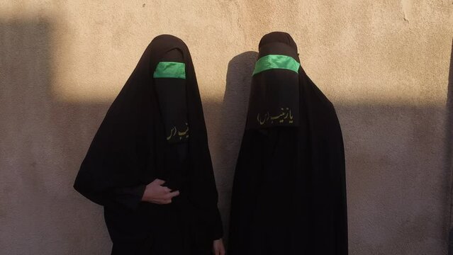 Iranian shiite women with their faces hidden by a veil Khorramabad Iran