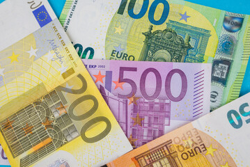 Different Euro banknotes as background, closeup.