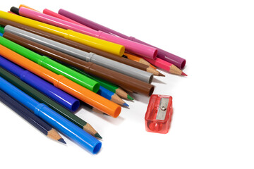 A bunch of felt-tip pens and colored pencils isolated on a white background. Back to school and kindergarten concept.