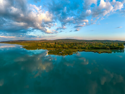 Aerial view about the north end  of lake Balaton in Hungary. This place is at Balatonfuzfo town. .Lake Balaton with fantastic colorful  clouds early in a morning