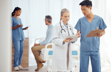 Teamwork, doctor or surgeon with tablet or checklist in hospital meeting or discussion for...