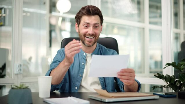 Excited manager businessman receiving mail letter reading good news new offer job overjoyed man winner enjoy success winning, career growth advance promotion, bank loan approve, monetary award.