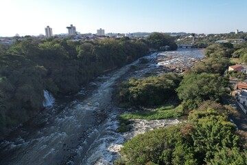 Fototapeta na wymiar Piracicaba river waterfall at the city of same name, in Sao Paulo, Brazil.