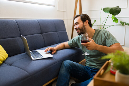 Attractive man on a virtual date with his long-distance girlfriend