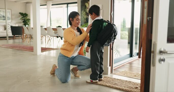 Education, ready and mother with child in home for back to school, morning routine and leaving house. Academy, family and happy mom helping kid getting dressed for learning, knowledge and uniform