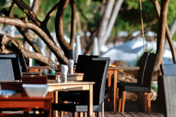 Table setting at tropical beach restaurant.