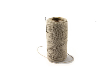 Image of a spool of gray thick strong threads.