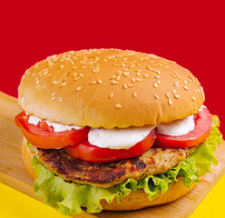 Burgers with cutlet, tomato and lettuce