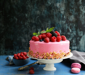 pink cake with fresh berries