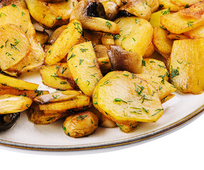 Potatoes with fried mushrooms on a plate