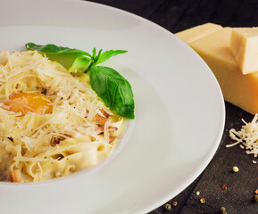 Pasta carbonara with ham and cheese