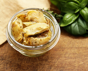grilled artichokes in oil with spices and herbs