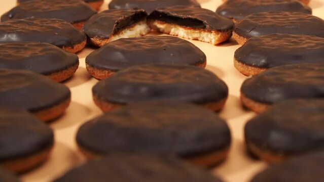 Cookies with dark chocolate and orange marmalade. Camera zoom in on cookies.