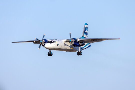 Luqa, Malta - July 31, 2023: Vulkan Air Antonov An-26B (REG: UR-CQD) on finals runway 31 in the evening.