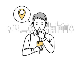 スマートフォンで現在地を確認する若い男性