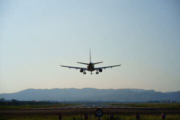 Fototapeta na wymiar airplane approaching runway