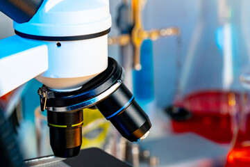 Microscope lenses on a laboratory desk close up