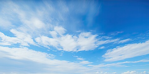 Obraz premium Summer sky. Blue and white cloudscape. Nature beauty. Abstract sky with clouds. Sunlight beautiful view