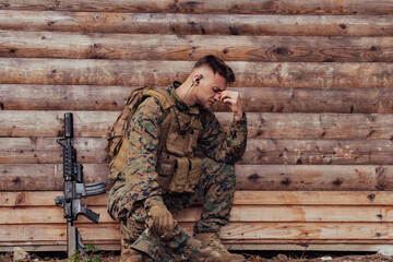 Upset soldier has psychological problems holding his head
