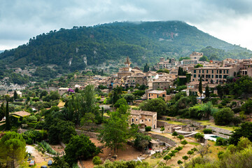 View of a medieval street of the picturesque Spanish-style village Valdemossa in Majorca or Mallorca island, Spain.