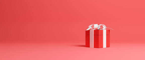 Merry christmas and Happy New Year. Gift box tied with a ribbon isolated on red background and copy space. Christmas present, valentine day surprise, birthday, anniversary, wedding concept.3d render