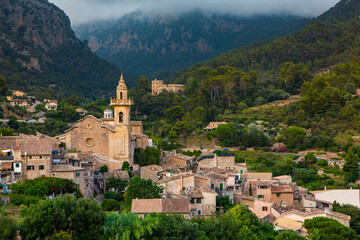 Fototapeta na wymiar View of a medieval street of the picturesque Spanish-style village Valdemossa in Majorca or Mallorca island, Spain.