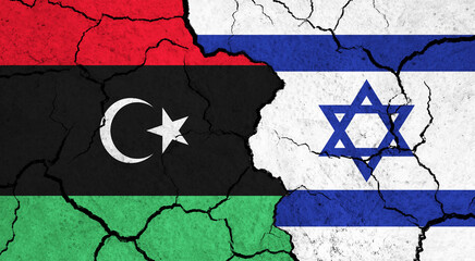 Flags of Libya and Israel on cracked surface - politics, relationship concept