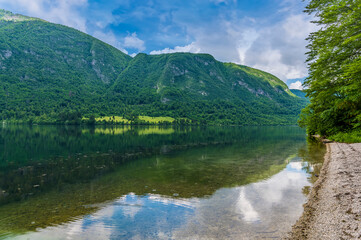 A view along the southern shore of lake Bohinj, Slovenia in summertime