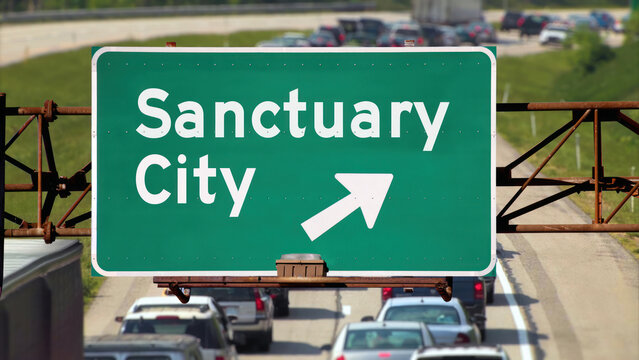 A hypothetical Sanctuary City highway road sign.  	