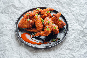 Crispy Fried Chicken Wings Topped with Green Onions
