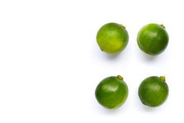 Fresh limes on white background.