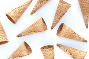 Empty ice cream cone on white background.