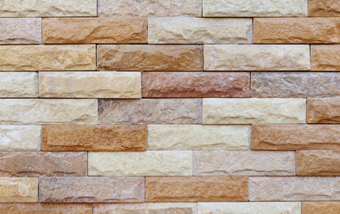 Sandstone brick wall texture with vintage style for background and design art work.