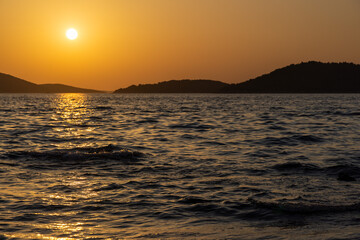 Obraz premium Sunset on the Adriatic Sea near Zlarin Island, Croatia