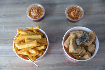 Fried Tofu and Peanut Sauce on the table . Vegetarians food.