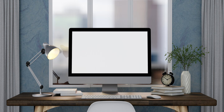 A modern PC computer blank screen mockup is on a table in a modern minimal home office. 3d render illustration