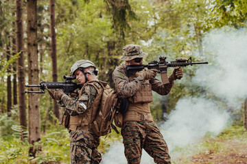 Fototapeta premium Modern Warfare Soldiers Squad Running in Tactical Battle Formation Woman as a Team Leader