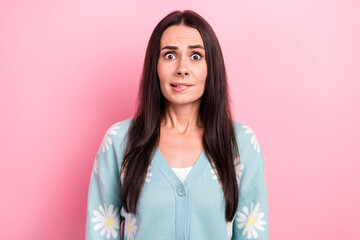 Fototapeta premium Portrait of horrified frightened girl with long hairstyle wear flower print pullover biting lips staring isolated on pink color background
