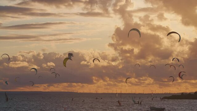 professional kite surfing on ocean or sea sunset, kitesurfing training at water